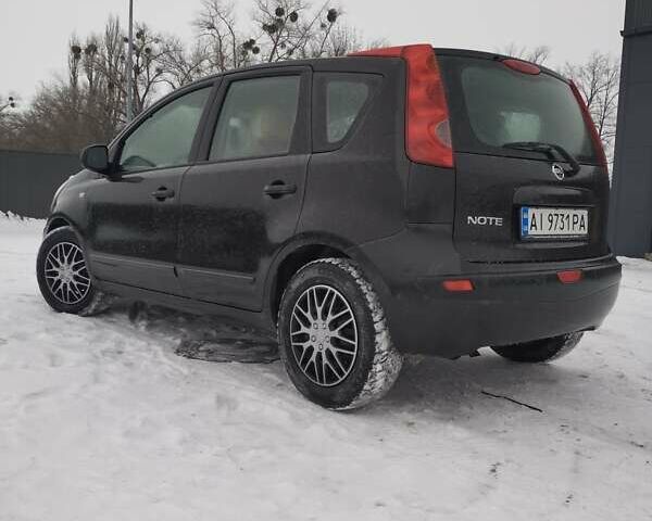 Черный Ниссан Ноут, объемом двигателя 1.4 л и пробегом 300 тыс. км за 5200 $, фото 17 на Automoto.ua