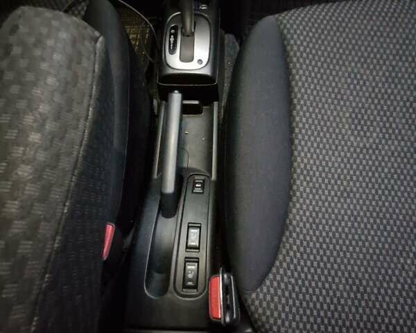 Ніссан Ноут 2006 у Києві на Automoto.ua Чорний Ніссан Ноут, об'ємом двигуна 1.6 л та пробігом 226 тис. км за 6000 $, фото 16 на Automoto.ua