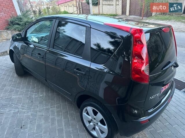Черный Ниссан Ноут, объемом двигателя 1.6 л и пробегом 167 тыс. км за 5500 $, фото 24 на Automoto.ua