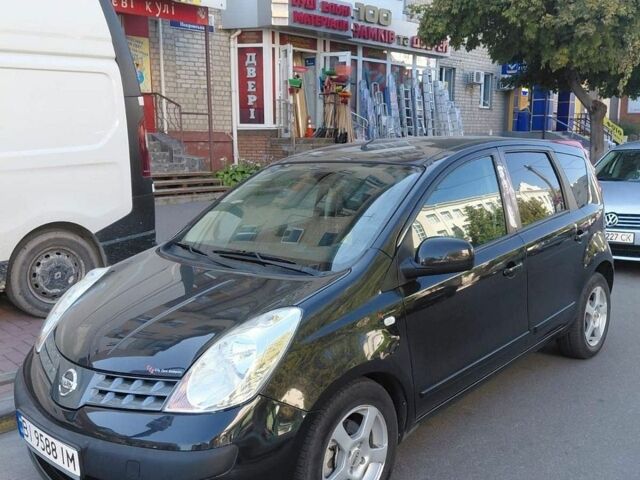 Черный Ниссан Ноут, объемом двигателя 1.6 л и пробегом 245 тыс. км за 5650 $, фото 1 на Automoto.ua