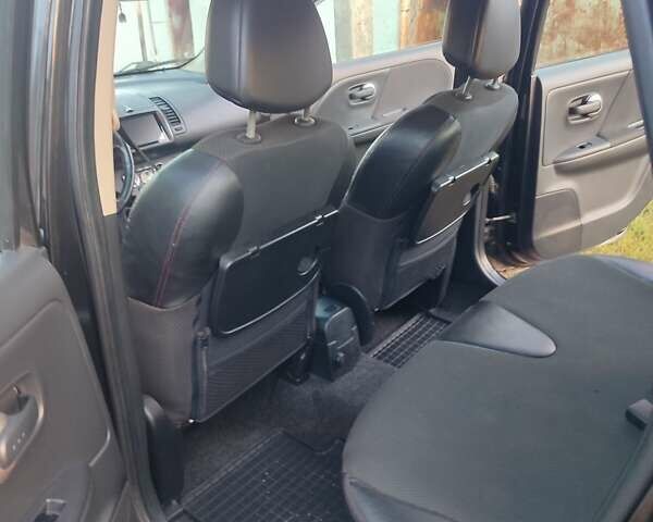 Черный Ниссан Ноут, объемом двигателя 1.6 л и пробегом 110 тыс. км за 4700 $, фото 13 на Automoto.ua