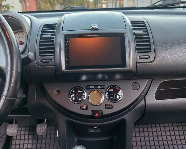 Черный Ниссан Ноут, объемом двигателя 1.6 л и пробегом 110 тыс. км за 4700 $, фото 12 на Automoto.ua