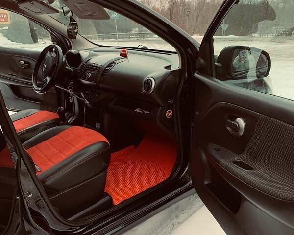 Чорний Ніссан Ноут, об'ємом двигуна 1.39 л та пробігом 205 тис. км за 5600 $, фото 13 на Automoto.ua