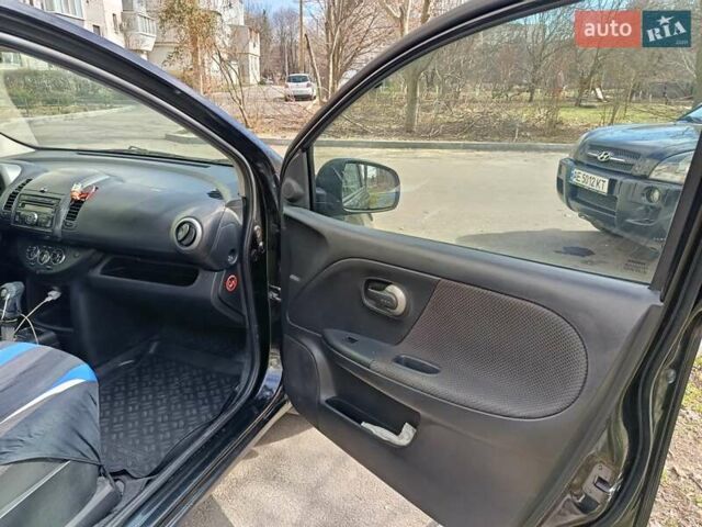 Чорний Ніссан Ноут, об'ємом двигуна 1.6 л та пробігом 210 тис. км за 5500 $, фото 13 на Automoto.ua