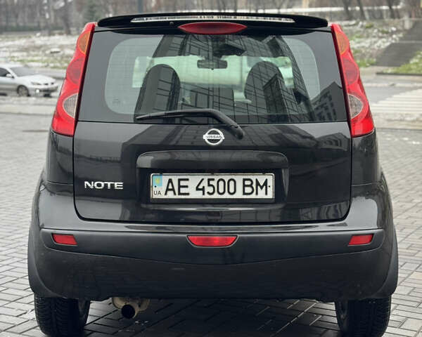Черный Ниссан Ноут, объемом двигателя 1.6 л и пробегом 176 тыс. км за 5600 $, фото 3 на Automoto.ua