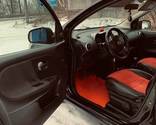 Чорний Ніссан Ноут, об'ємом двигуна 1.39 л та пробігом 205 тис. км за 5600 $, фото 7 на Automoto.ua