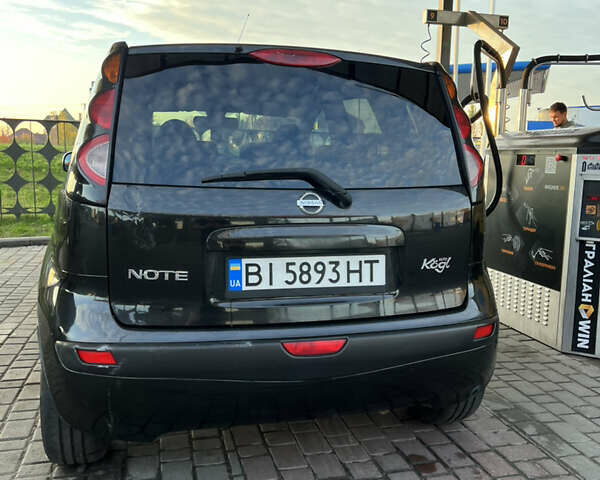 Черный Ниссан Ноут, объемом двигателя 1.6 л и пробегом 300 тыс. км за 4800 $, фото 3 на Automoto.ua