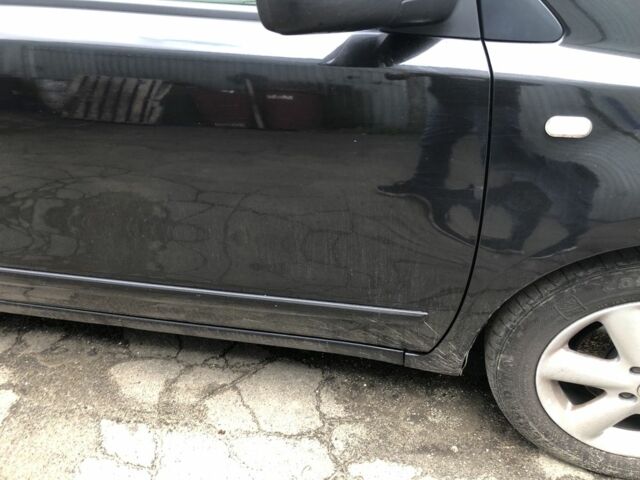 Чорний Ніссан Ноут, об'ємом двигуна 1.6 л та пробігом 370 тис. км за 5800 $, фото 6 на Automoto.ua