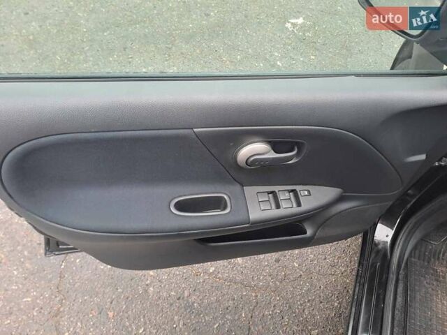 Черный Ниссан Ноут, объемом двигателя 1.4 л и пробегом 186 тыс. км за 5400 $, фото 5 на Automoto.ua