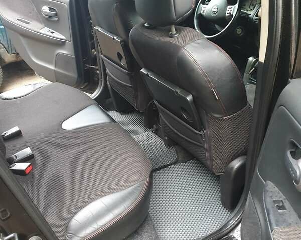 Чорний Ніссан Ноут, об'ємом двигуна 1.6 л та пробігом 208 тис. км за 6500 $, фото 7 на Automoto.ua