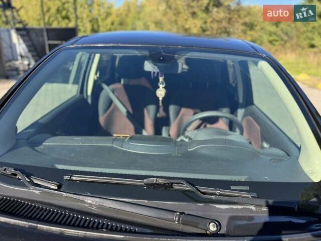 Черный Ниссан Ноут, объемом двигателя 1.6 л и пробегом 212 тыс. км за 5999 $, фото 1 на Automoto.ua