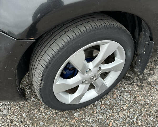 Чорний Ніссан Ноут, об'ємом двигуна 1.39 л та пробігом 270 тис. км за 3950 $, фото 10 на Automoto.ua