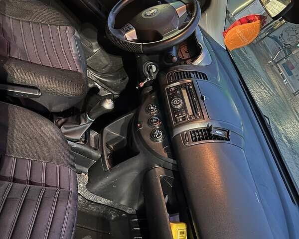 Чорний Ніссан Ноут, об'ємом двигуна 1.4 л та пробігом 230 тис. км за 4900 $, фото 2 на Automoto.ua