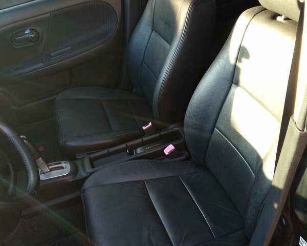 Черный Ниссан Ноут, объемом двигателя 1.5 л и пробегом 127 тыс. км за 6600 $, фото 3 на Automoto.ua