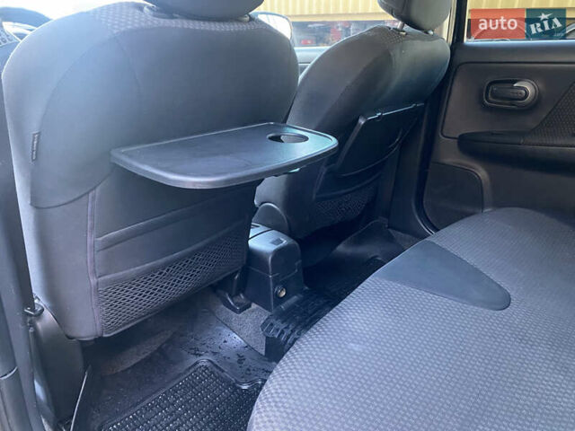 Чорний Ніссан Ноут, об'ємом двигуна 1.4 л та пробігом 290 тис. км за 5699 $, фото 6 на Automoto.ua