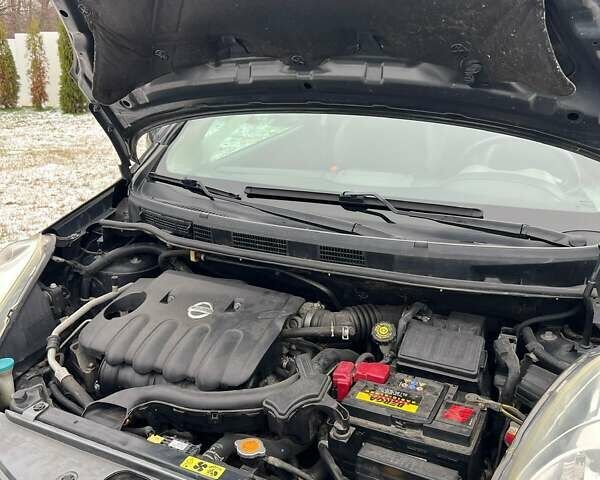 Черный Ниссан Ноут, объемом двигателя 1.6 л и пробегом 143 тыс. км за 6499 $, фото 15 на Automoto.ua