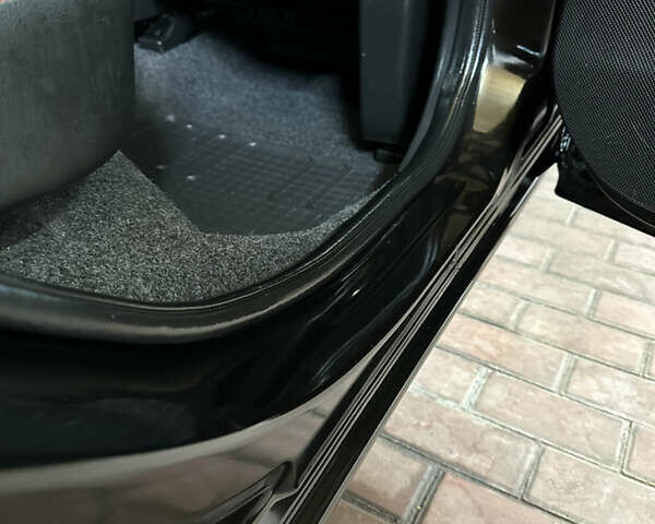 Чорний Ніссан Ноут, об'ємом двигуна 1.6 л та пробігом 200 тис. км за 5750 $, фото 13 на Automoto.ua