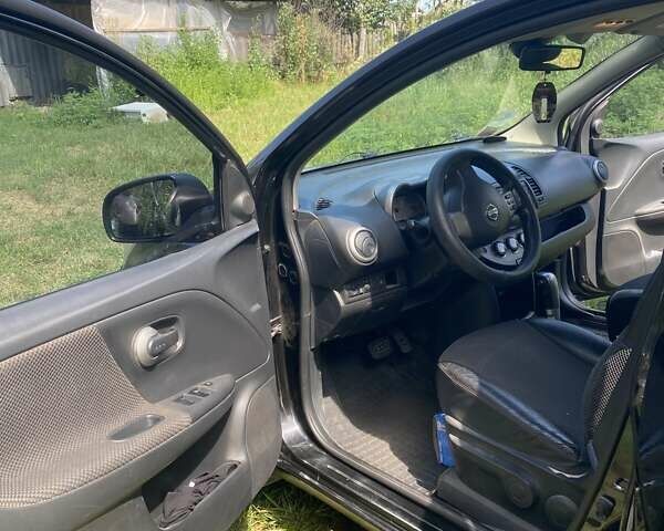 Черный Ниссан Ноут, объемом двигателя 1.6 л и пробегом 196 тыс. км за 6400 $, фото 10 на Automoto.ua