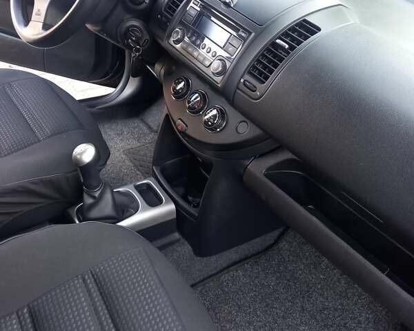 Чорний Ніссан Ноут, об'ємом двигуна 1.4 л та пробігом 140 тис. км за 6500 $, фото 9 на Automoto.ua