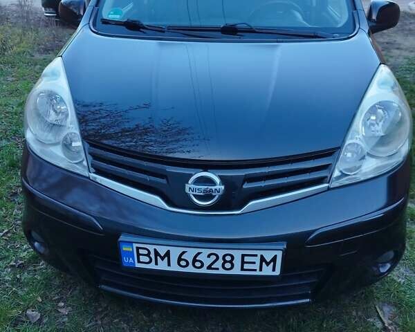 Черный Ниссан Ноут, объемом двигателя 1.4 л и пробегом 190 тыс. км за 6100 $, фото 1 на Automoto.ua