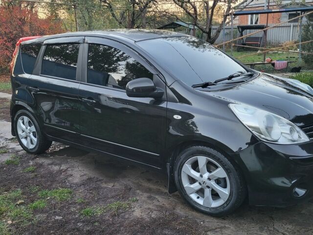 Черный Ниссан Ноут, объемом двигателя 1.4 л и пробегом 215 тыс. км за 6300 $, фото 2 на Automoto.ua