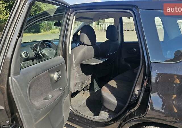 Чорний Ніссан Ноут, об'ємом двигуна 1.4 л та пробігом 180 тис. км за 6100 $, фото 7 на Automoto.ua