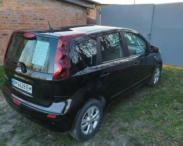 Черный Ниссан Ноут, объемом двигателя 1.4 л и пробегом 190 тыс. км за 6100 $, фото 4 на Automoto.ua