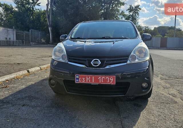 Чорний Ніссан Ноут, об'ємом двигуна 1.4 л та пробігом 180 тис. км за 6100 $, фото 9 на Automoto.ua