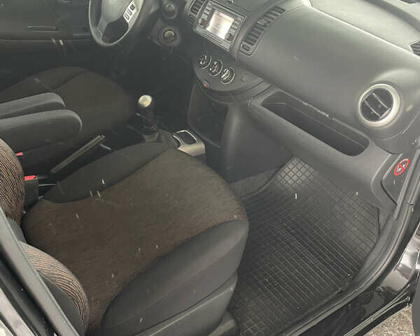 Черный Ниссан Ноут, объемом двигателя 1.4 л и пробегом 244 тыс. км за 5799 $, фото 7 на Automoto.ua