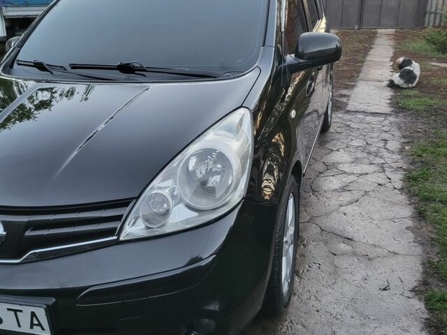 Черный Ниссан Ноут, объемом двигателя 1.4 л и пробегом 215 тыс. км за 6300 $, фото 3 на Automoto.ua