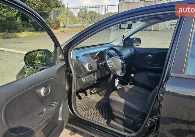 Чорний Ніссан Ноут, об'ємом двигуна 1.4 л та пробігом 180 тис. км за 6100 $, фото 6 на Automoto.ua