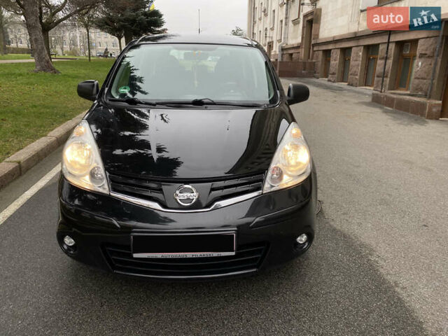 Черный Ниссан Ноут, объемом двигателя 1.4 л и пробегом 203 тыс. км за 5750 $, фото 1 на Automoto.ua