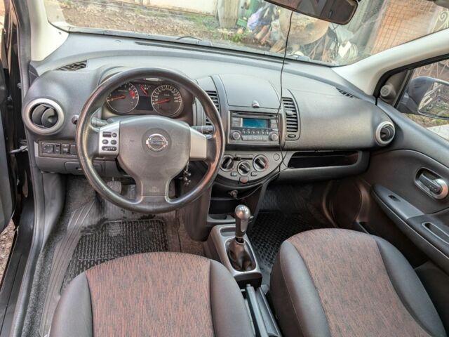 Чорний Ніссан Ноут, об'ємом двигуна 1.4 л та пробігом 127 тис. км за 6614 $, фото 7 на Automoto.ua