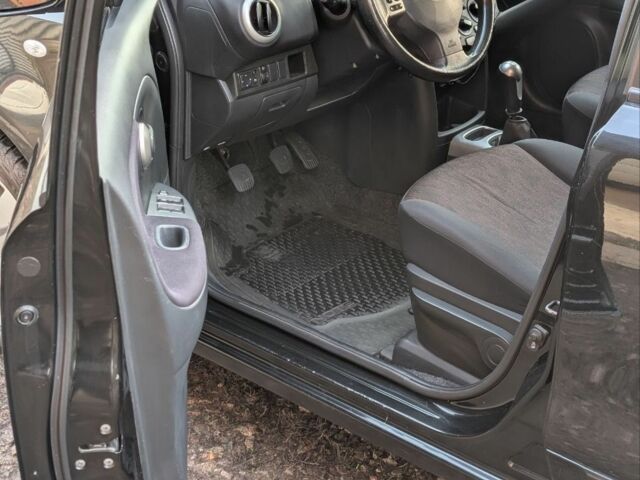 Чорний Ніссан Ноут, об'ємом двигуна 1.4 л та пробігом 127 тис. км за 6614 $, фото 3 на Automoto.ua