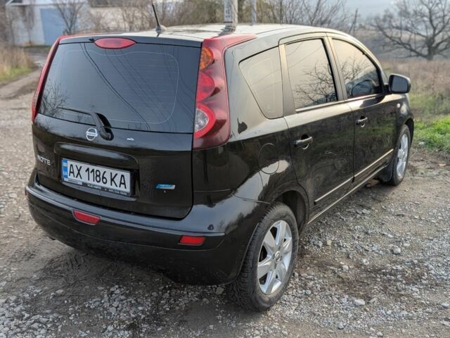 Чорний Ніссан Ноут, об'ємом двигуна 1.4 л та пробігом 127 тис. км за 6614 $, фото 8 на Automoto.ua
