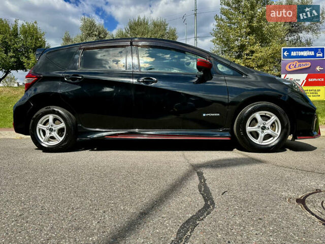 Чорний Ніссан Ноут, об'ємом двигуна 1.2 л та пробігом 57 тис. км за 13400 $, фото 4 на Automoto.ua