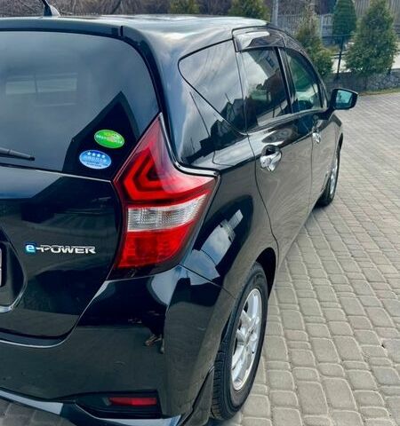 Чорний Ніссан Ноут, об'ємом двигуна 1.2 л та пробігом 60 тис. км за 10999 $, фото 38 на Automoto.ua