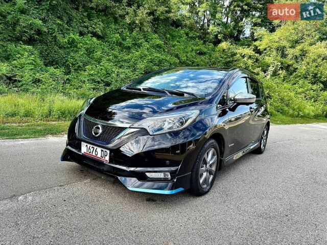 Чорний Ніссан Ноут, об'ємом двигуна 1.2 л та пробігом 73 тис. км за 12650 $, фото 3 на Automoto.ua