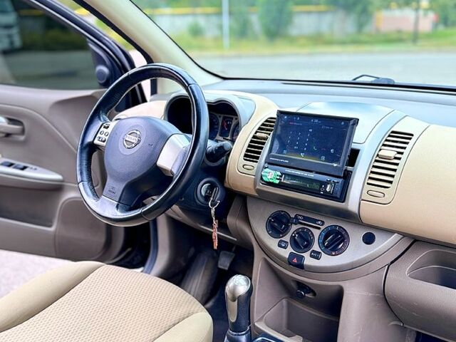 Чорний Ніссан Ноут, об'ємом двигуна 1.4 л та пробігом 172 тис. км за 5400 $, фото 6 на Automoto.ua