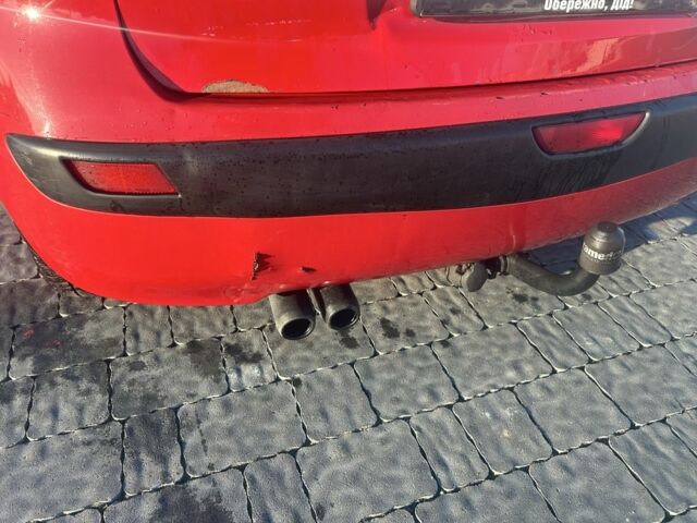 Червоний Ніссан Ноут, об'ємом двигуна 1.4 л та пробігом 307 тис. км за 4500 $, фото 6 на Automoto.ua