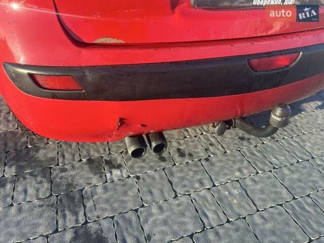 Червоний Ніссан Ноут, об'ємом двигуна 1.4 л та пробігом 307 тис. км за 4500 $, фото 5 на Automoto.ua