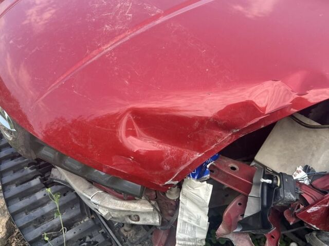 Червоний Ніссан Ноут, об'ємом двигуна 1.4 л та пробігом 120 тис. км за 2000 $, фото 17 на Automoto.ua