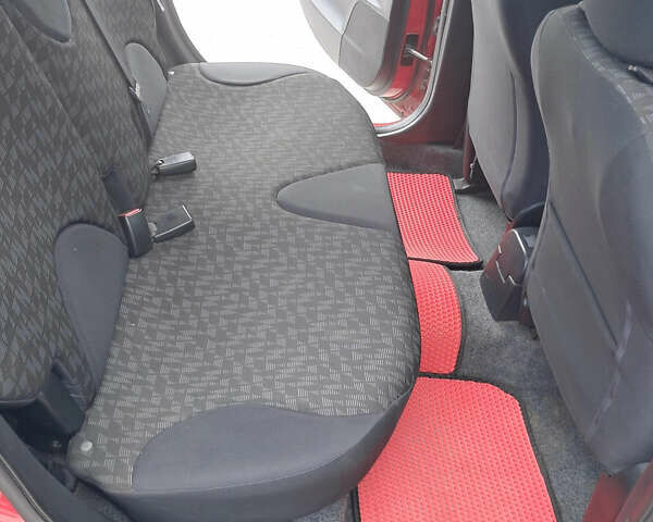 Червоний Ніссан Ноут, об'ємом двигуна 1.39 л та пробігом 182 тис. км за 5499 $, фото 12 на Automoto.ua