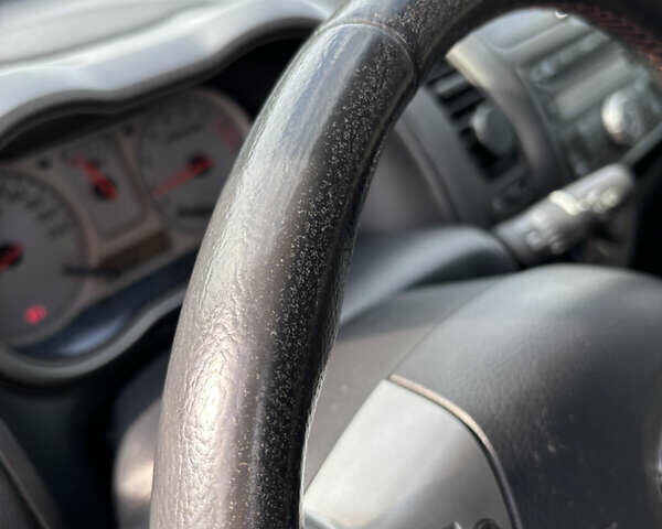 Ниссан Ноут 2008 в Киеве на Automoto.ua Красный Ниссан Ноут, объемом двигателя 1.6 л и пробегом 260 тыс. км за 5250 $, фото 34 на Automoto.ua