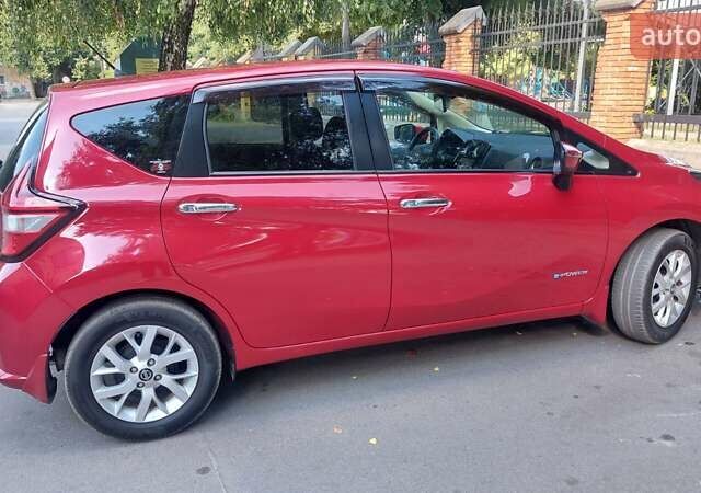 Червоний Ніссан Ноут, об'ємом двигуна 1.2 л та пробігом 58 тис. км за 11950 $, фото 9 на Automoto.ua