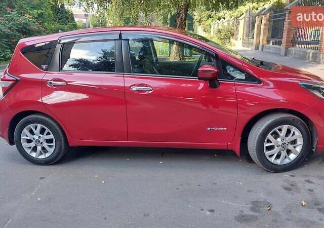 Червоний Ніссан Ноут, об'ємом двигуна 1.2 л та пробігом 58 тис. км за 11950 $, фото 5 на Automoto.ua
