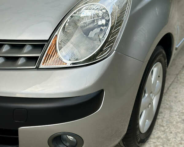 Сірий Ніссан Ноут, об'ємом двигуна 1.4 л та пробігом 130 тис. км за 5450 $, фото 78 на Automoto.ua