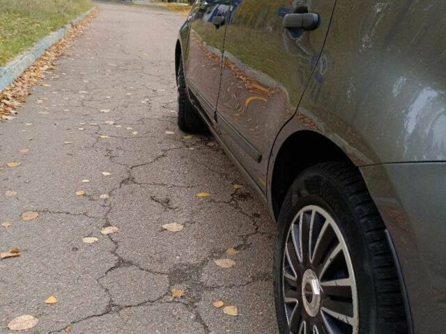 Серый Ниссан Ноут, объемом двигателя 1.4 л и пробегом 218 тыс. км за 4700 $, фото 9 на Automoto.ua