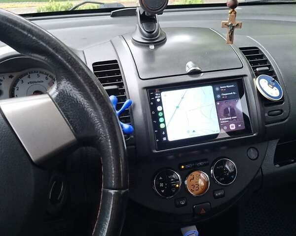 Серый Ниссан Ноут, объемом двигателя 1.6 л и пробегом 250 тыс. км за 7000 $, фото 3 на Automoto.ua