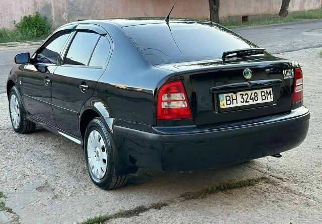 Сірий Ніссан Ноут, об'ємом двигуна 1.6 л та пробігом 170 тис. км за 5200 $, фото 5 на Automoto.ua